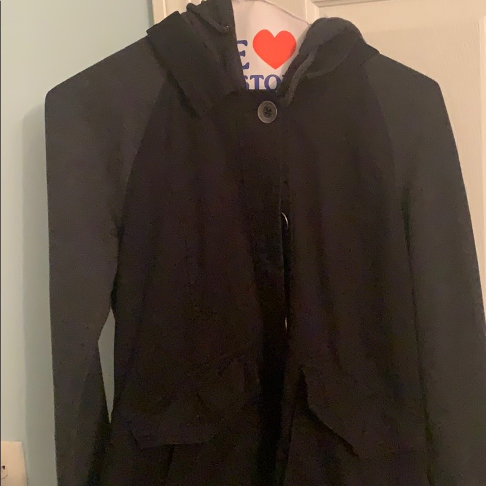 black jean jacket with sweater sleeves